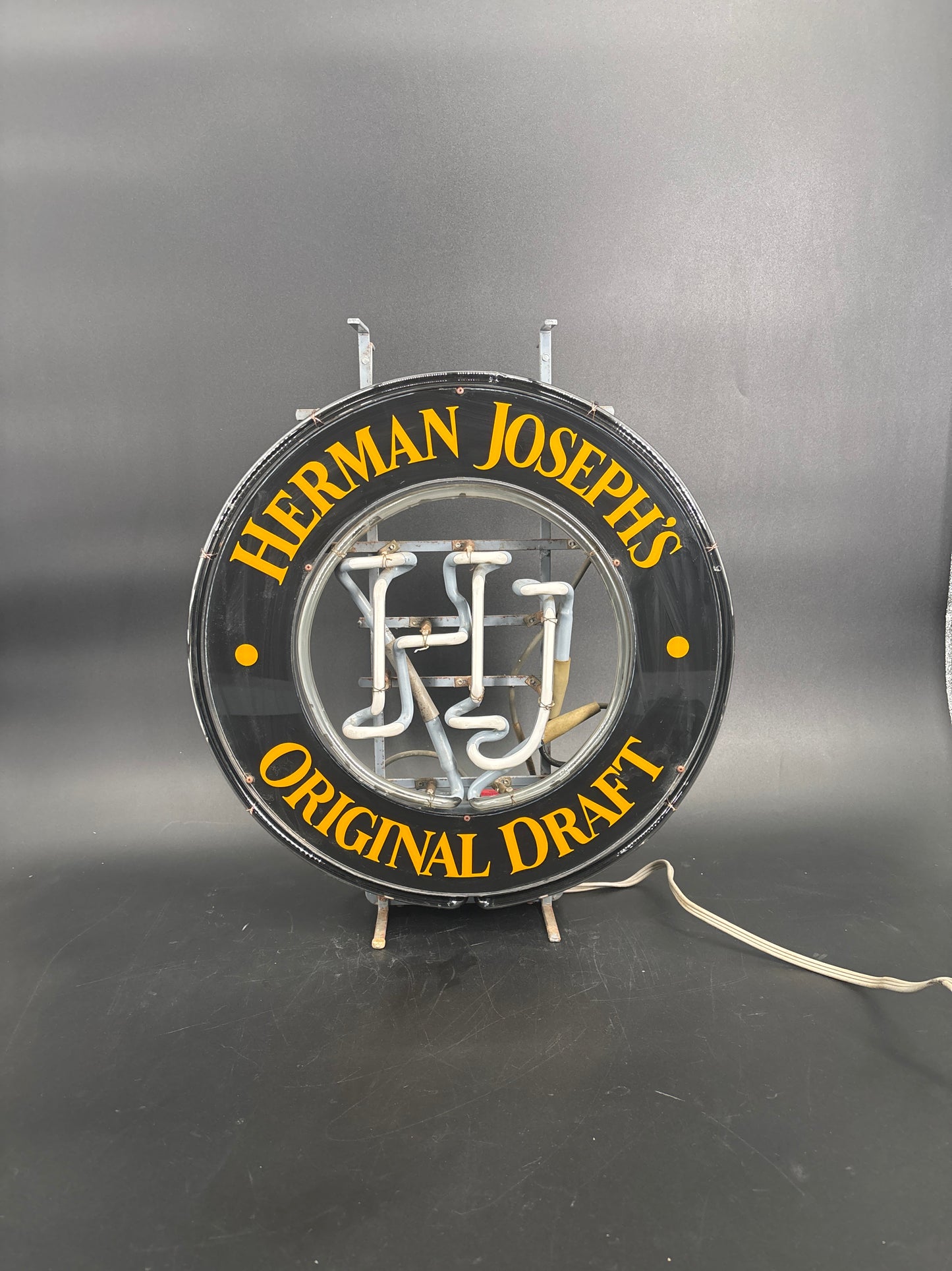 Herman Joseph’s Neon Sign